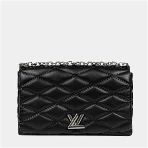 louis vuitton black quilted handbag.